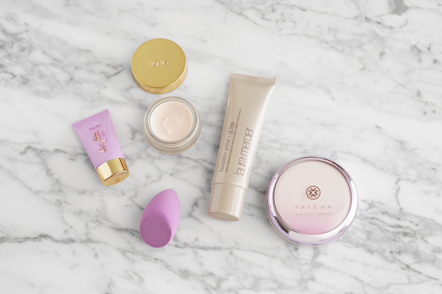 Tarte Primers, Sponge, Laura Mercier Oil-Free Primer and Tatcha Silk Canvas