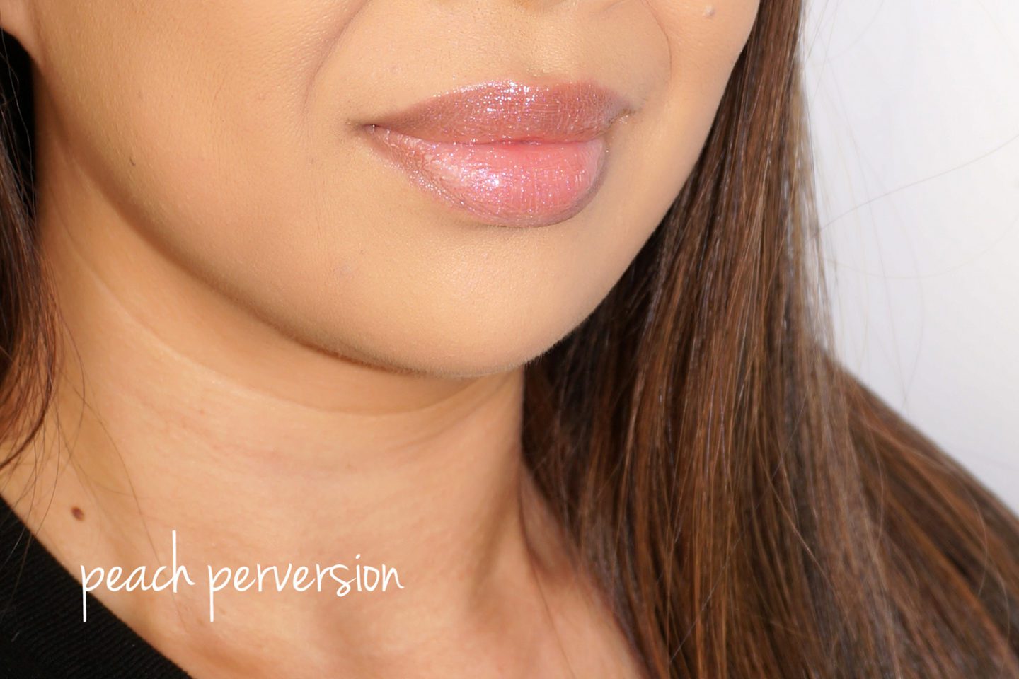 Pat McGrath LUST Gloss Peach Perversion swatch via Skin Glow Find