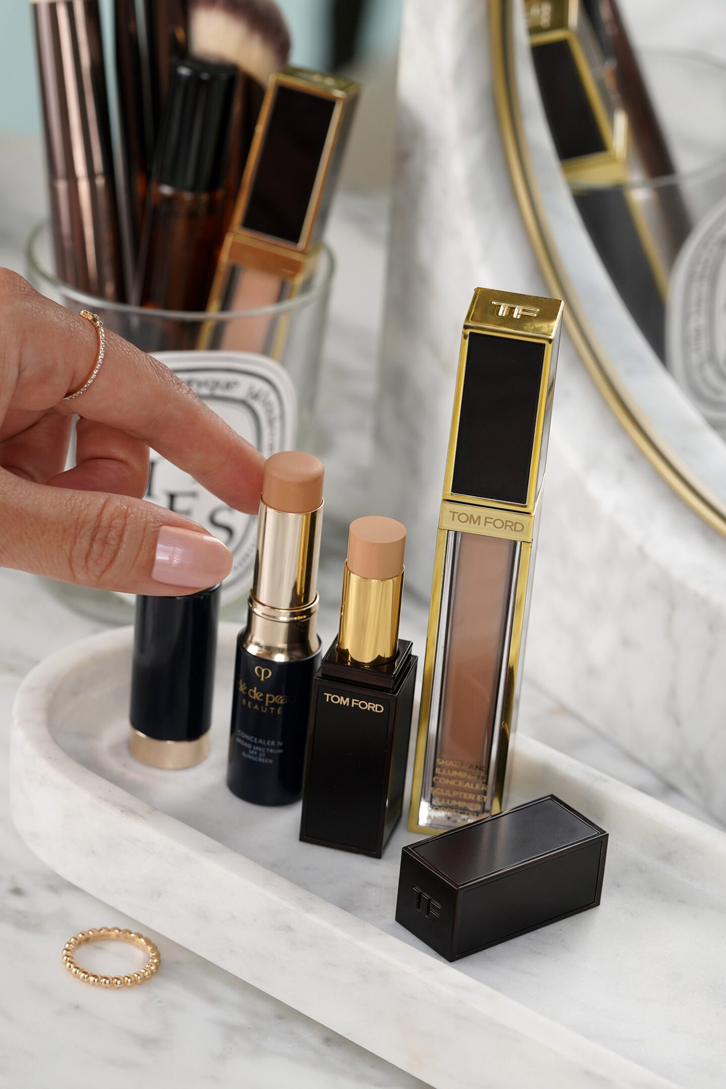 Cle de Peau Concealer in Buff vs Tom Ford Concealer in 3W1 Golden