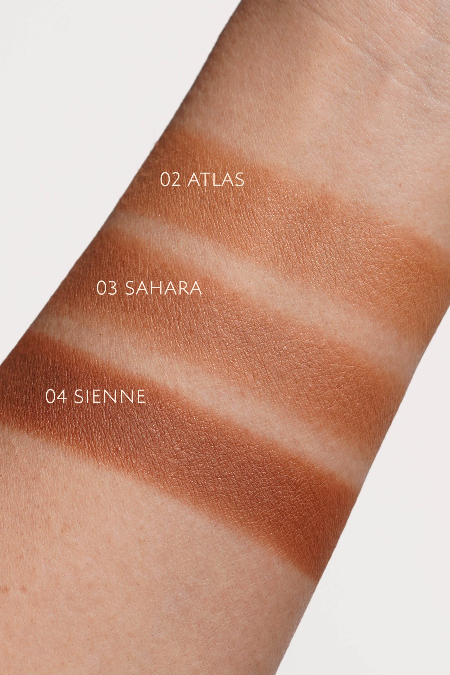 Hermes Plein Air H Trio Mineral Powder Bronzer 02 Atlas, 03 Sahara, 04 Sienne swatches